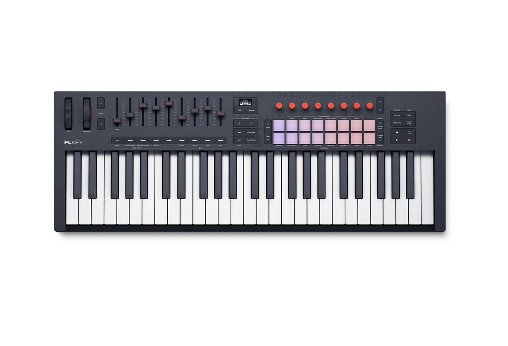 Black and white MIDI controller keyboard with keys, pads, knobs, faders, and a small screen