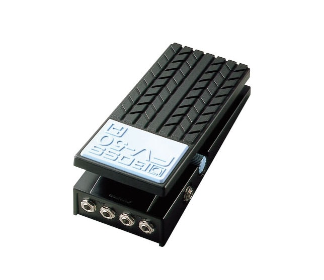 Black and silver volume pedal with four 1/4 inch audio jacks on the side and textured tread top surface.