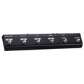 Black metal foot controller with six labeled footswitches for channel and effect control.