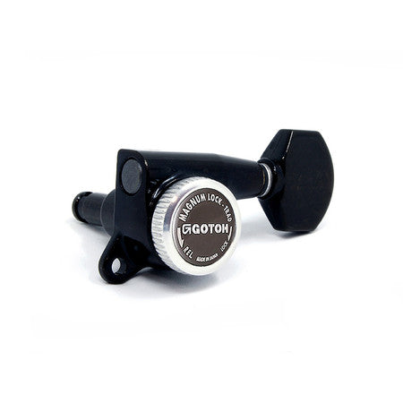 Single black metal locking guitar tuner with silver circular knob labeled Gotoh.