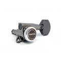 Single black metal locking guitar tuner with hexagonal tuning peg and engraved top cap.