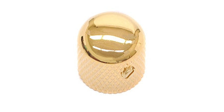 A short, gold-colored dome-shaped metal knob with textured sides and a small set screw.