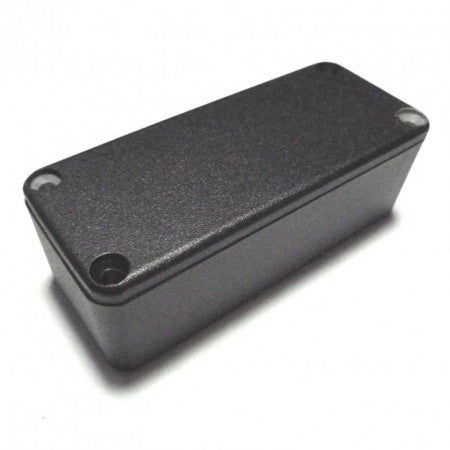 Small black rectangular metal enclosure with screw holes at corners on top surface.