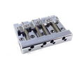 Chrome metal bridge assembly with four adjustable saddles and screws, marked with 'FENDER'