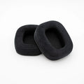 Pair of black rectangular velour ear pads for headphones on a white background.