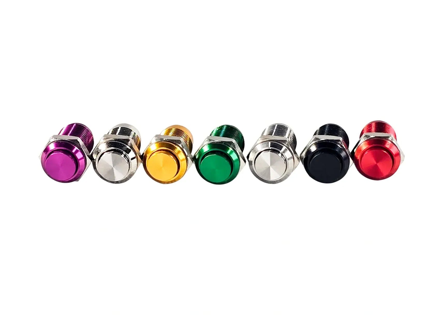 Seven metal push button switches in different colors arranged in a row on a white background.