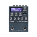Dark gray guitar effects pedal with multiple knobs, a screen, two foot switches, and input/output jacks on top.