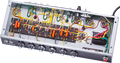 Open amplifier chassis showing internal wiring, components, and six black control knobs on front panel.