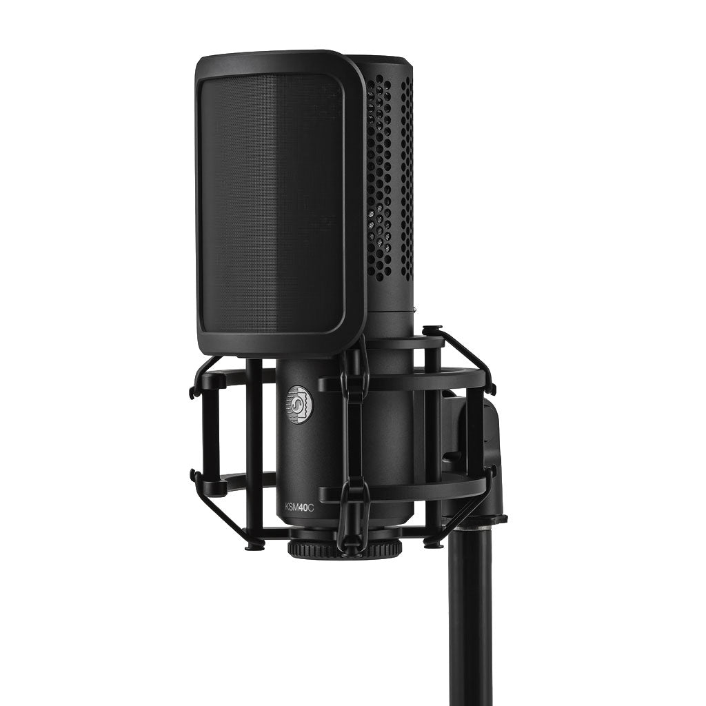Black studio microphone with shock mount and rectangular pop filter attached, labeled KSM40C.