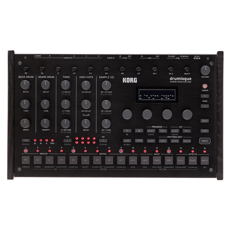 Top view of a black Korg drum machine with multiple knobs, buttons, a display screen, and various input/output ports.