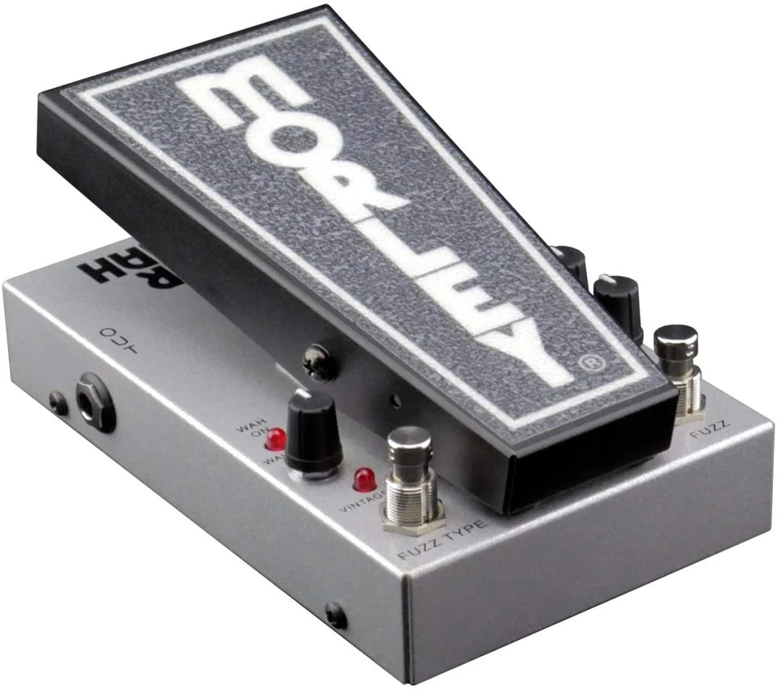 Silver and black guitar effects pedal with foot pedal labeled MORLEY and multiple control knobs and switches.