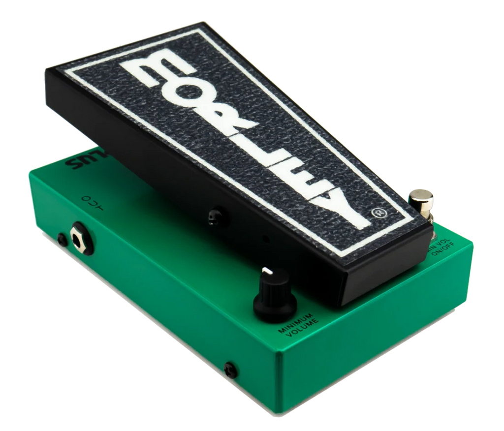 Green and black volume pedal with a foot pedal, control knob, toggle switch, and audio jack input.