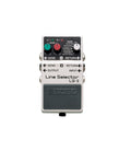 Top view of a BOSS Line Selector LS-2 effects pedal with knobs and multiple input/output jacks visible.