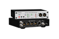 Black and silver audio converter device with multiple XLR and BNC connectors and control buttons on front panel.