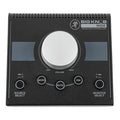 Black Mackie Big Knob Passive monitor controller with large volume knob and multiple control buttons on top panel.