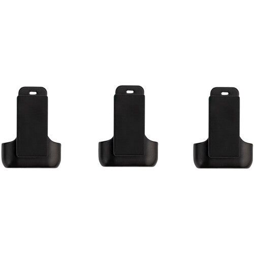 Three identical black plastic magnetic clips with a rectangular top and a cutout handle area, aligned in a row on a white background.