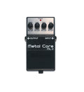 Black and silver guitar effects pedal with four knobs, two jacks, and labeled Metal Core ML-2 by Boss.