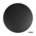 Close-up front view of a round black speaker grille with a Genelec logo tag on white background.