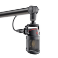 Black studio microphone suspended from a black adjustable microphone arm with visible red and silver branding details.