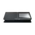 Black rectangular device with a perforated speaker area, touchscreen, and two buttons on the front.