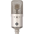 Silver Neumann condenser microphone with metal mesh grille and multi-pattern selector switch.