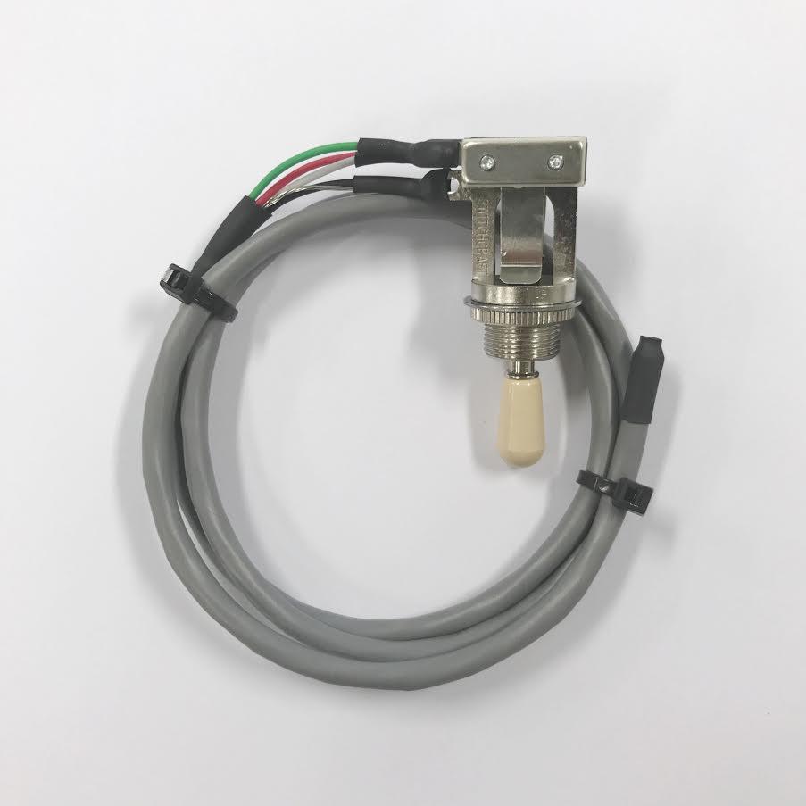 Prewired toggle switch with short straight handle and attached gray cable with multiple colored wires.