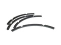 Four black curved gasket pieces arranged on a white background.