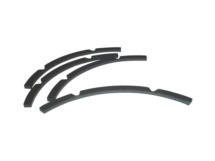 Four black curved gasket pieces arranged on a white background.