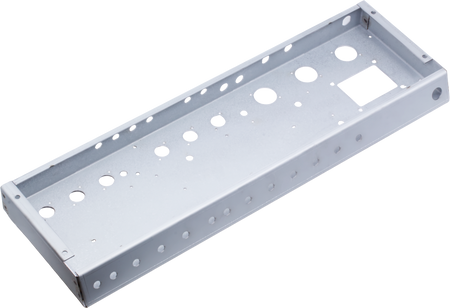 Rectangular metal chassis with multiple cutouts and holes for electronic components.