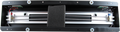 Metal reverb tank unit with black foam in the center and white connectors on each end.