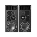 Front view of a pair of black PMC studio monitors with honeycomb pattern and visible drivers.