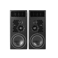 A large PMC PMC12 three-way active studio monitor with a black cabinet, drivers arranged vertically on the front baffle: a 12-inch bass driver, a mid-dome, and a soft-dome tweeter in a waveguide.