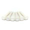 Six white plastic bridge pins each with a pearl-like white dot on top.