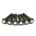 Six black cylindrical bridge pins with white circular inlays on one end arranged side by side on a white background.