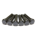 Six black bridge pins arranged in a row on a white background.