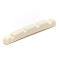 Curved off-white guitar nut with four string slots on a white background.