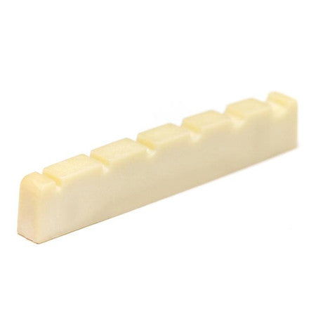 Off-white synthetic slotted guitar or bass nut with six string slots