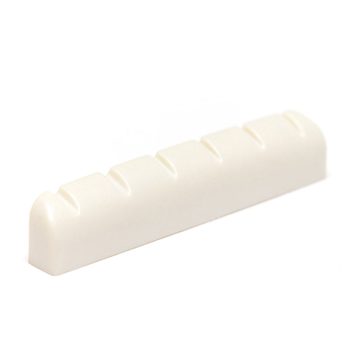 White plastic slotted guitar nut with six slots shown on a white background.