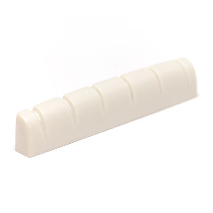 Off-white slotted guitar nut with six string slots