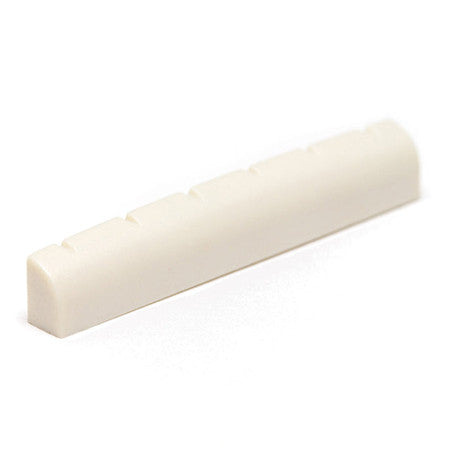 Off-white slotted guitar nut with six grooves, shown on white background.