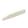 Off-white plastic or synthetic acoustic guitar saddle with compensation grooves visible.