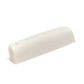 Off-white guitar nut with six string slots shown at an angled side view on white background.