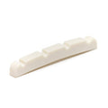 Off-white guitar nut with four string slots, viewed angled on a white background.