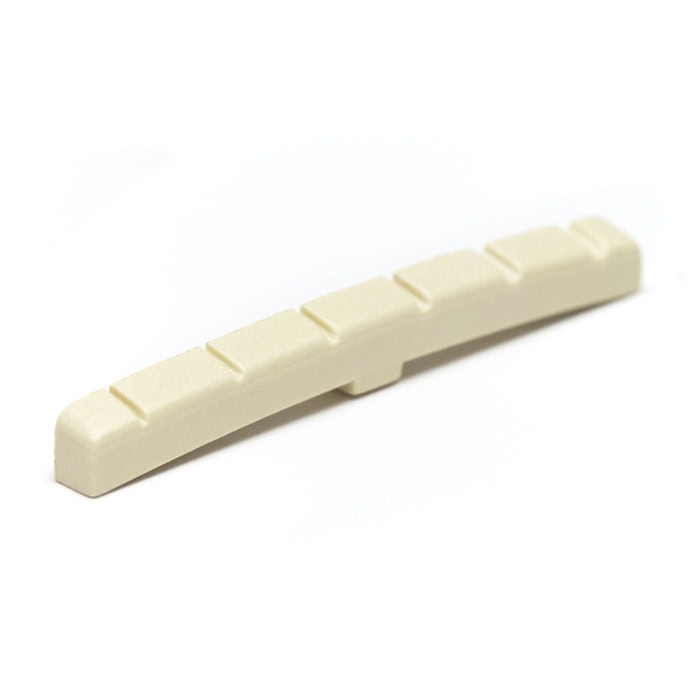 Curved off-white plastic guitar nut with six slots for strings shown on a white background.