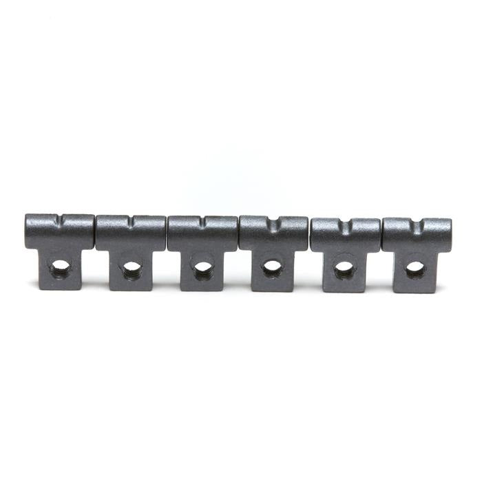 Six small gray metal parts with a hole and slot each, arranged in a row on a white background.