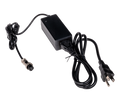 Black power adapter with attached cables and connectors including a 3-pin round connector and a 3-prong power plug.
