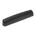 Black slotted guitar nut or saddle piece with 12 string slots, shown on white background.
