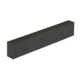 A black rectangular slab-shaped object with smooth surfaces shown against a white background.