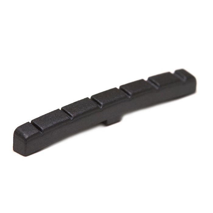 Black plastic curved slotted guitar nut with six slots for strings.