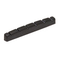 Black flat bottom guitar nut with six evenly spaced slots for strings.